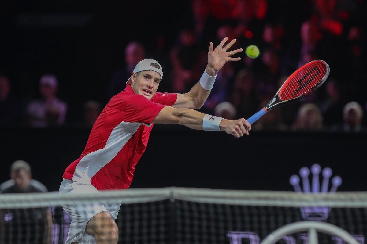 John Isner of Team World stretches for a forehand at the Laver Cup 2019 in Geneva