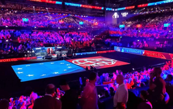 Laver Cup arena with the Team Europe and Team World flags laid out on court before play